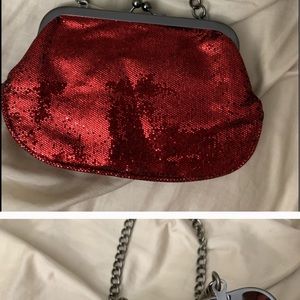 Red sequence express clutch with chain. Never used